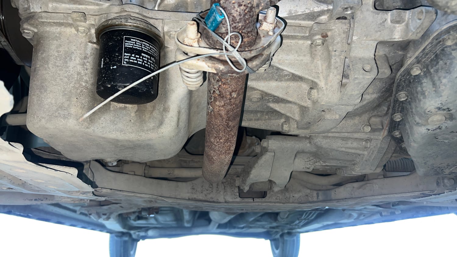 Used 2021 Maruti Suzuki XL6 Alpha AT Petrol Petrol Automatic extra FRONT LEFT UNDERBODY VIEW