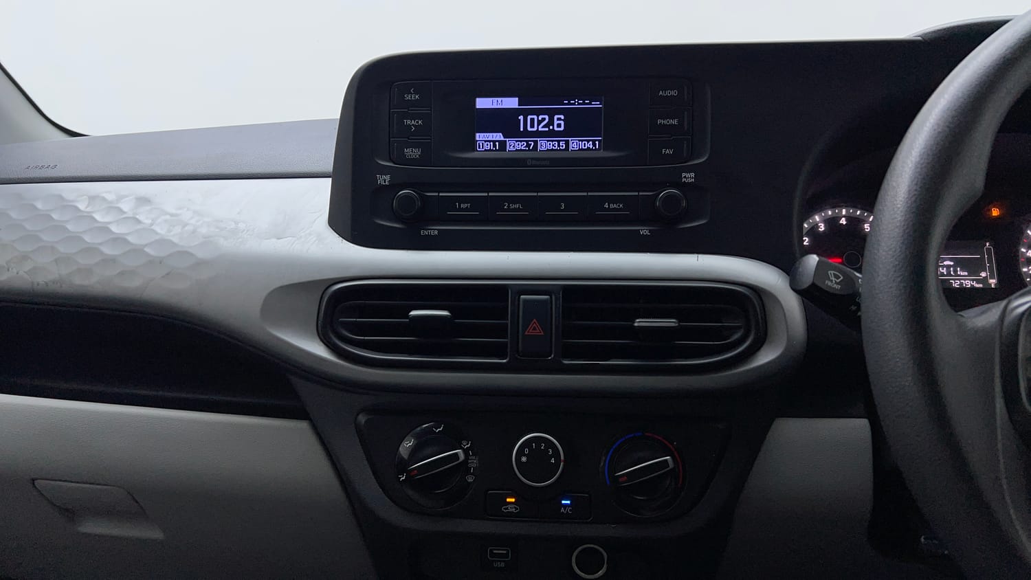 Used 2021 Hyundai Grand i10 Nios Magna 1.2 Kappa VTVT Petrol Manual interior MUSIC SYSTEM & AC CONTROL VIEW