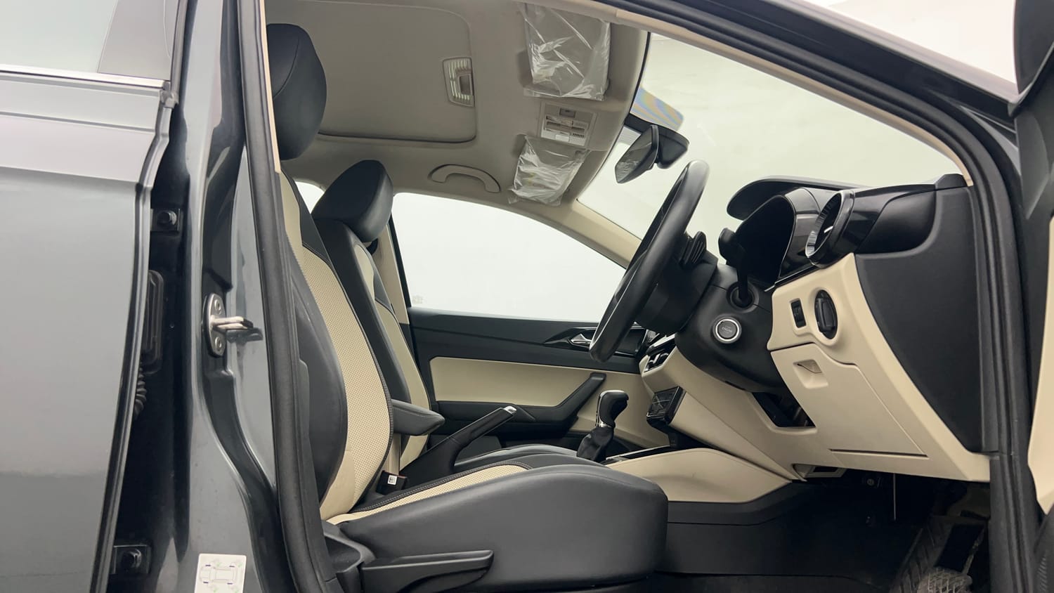 Used 2023 Skoda Slavia Style 1.0L TSI AT Petrol Automatic interior RIGHT SIDE FRONT DOOR CABIN VIEW