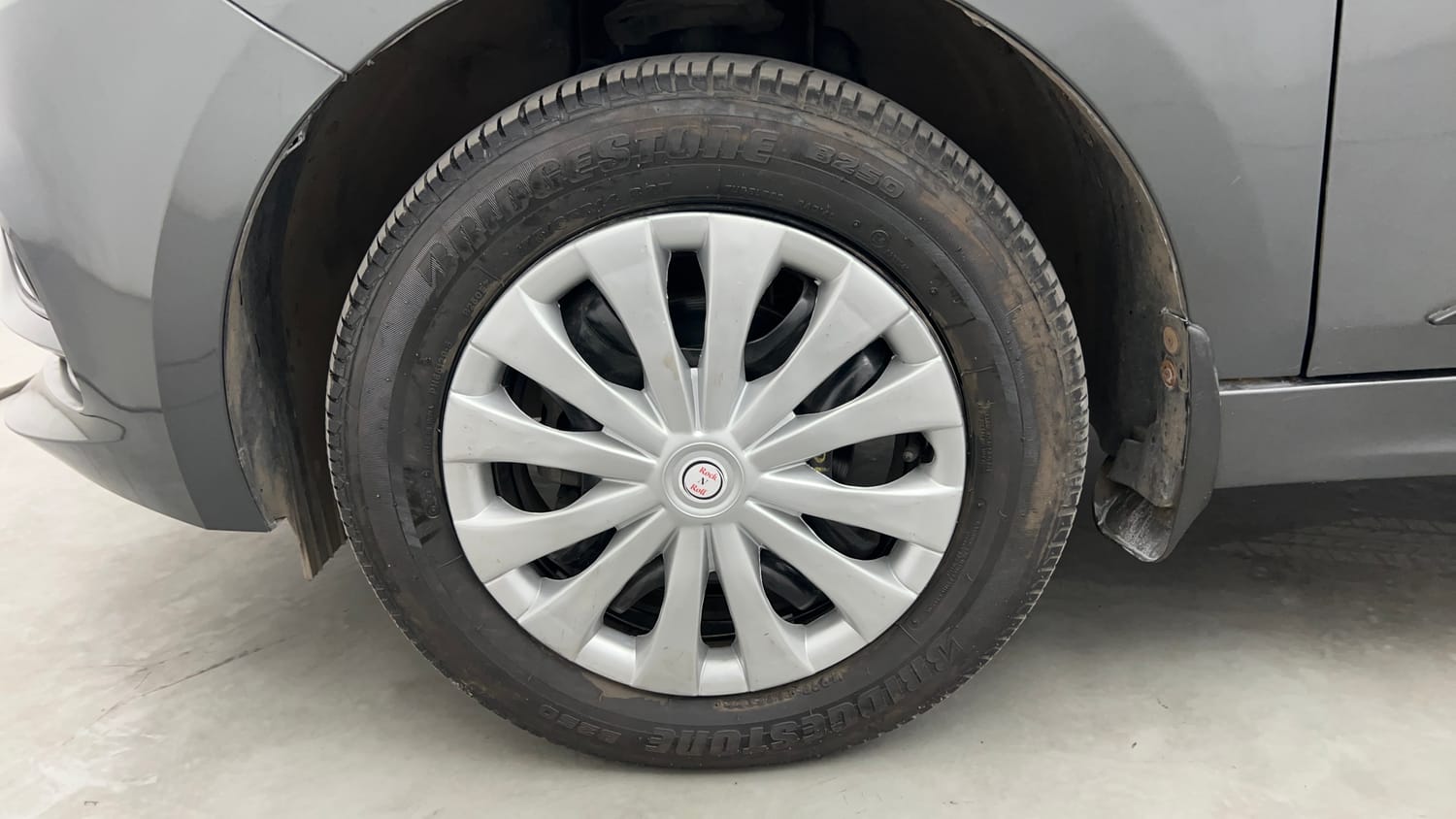 Used 2024 Tata Tiago XT Petrol Manual tyres LEFT FRONT TYRE RIM VIEW