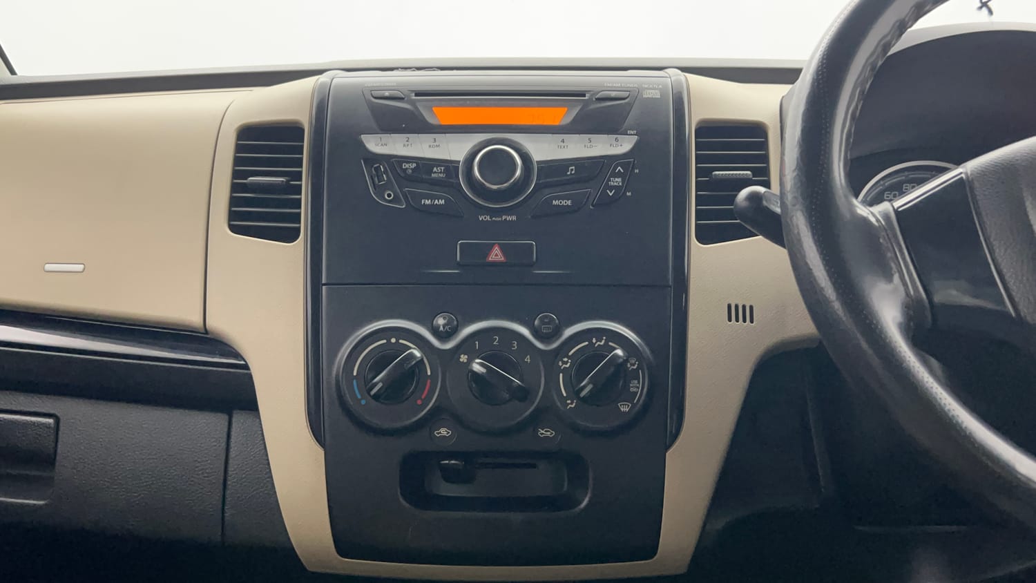 Used 2017 Maruti Suzuki Wagon R VXI Petrol Manual top_features Integrated (in-dash) music system