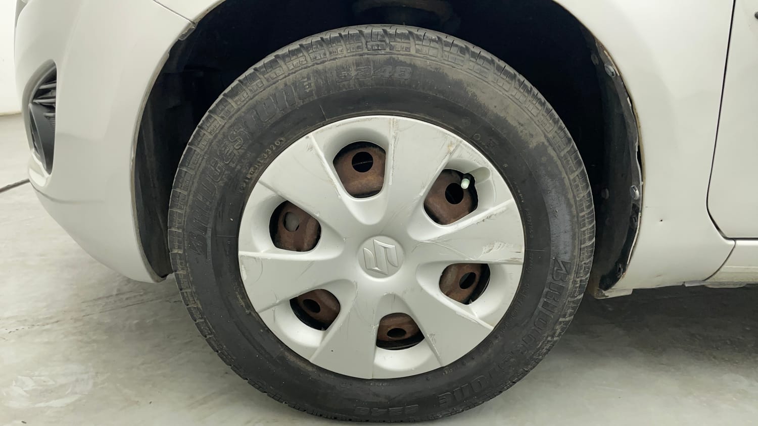 Used 2015 Maruti Suzuki Ritz Vxi BS-IV Petrol Manual tyres LEFT FRONT TYRE RIM VIEW