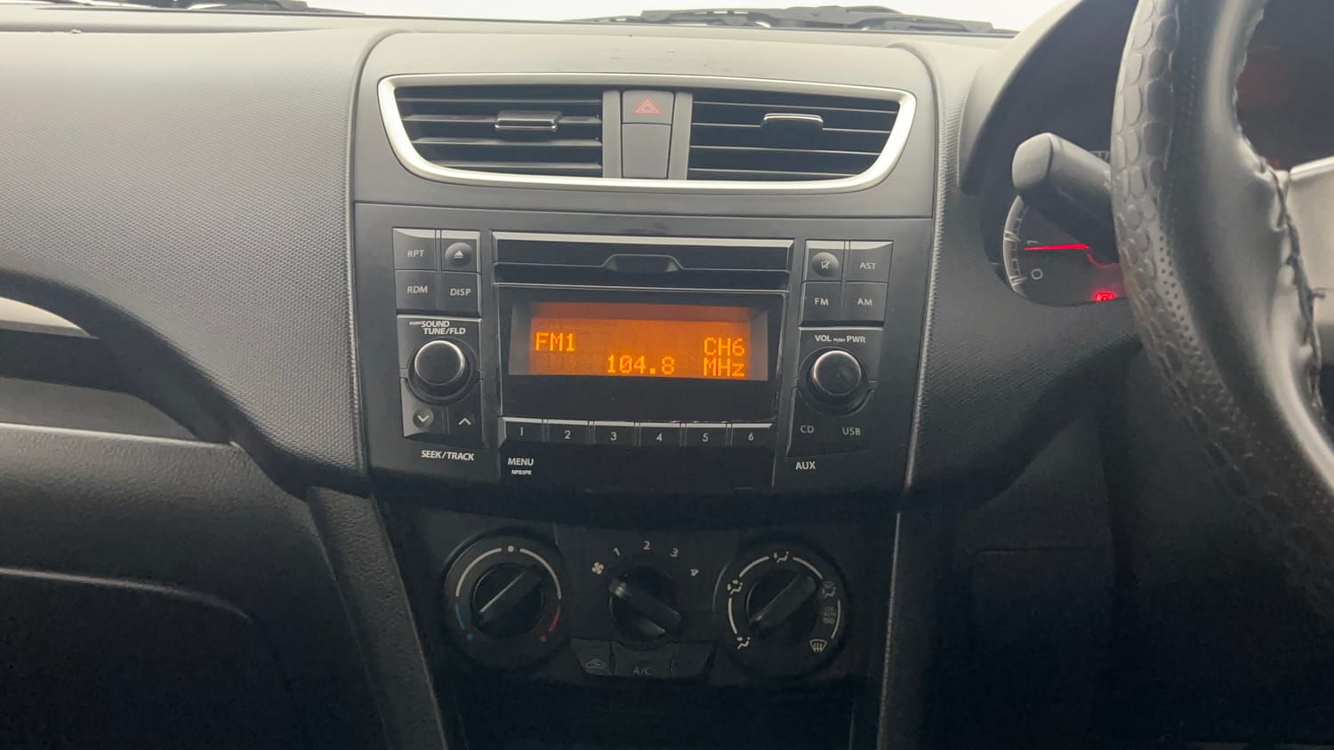 Used 2015 Maruti Suzuki Swift VXi Petrol Manual top_features Integrated (in-dash) music system