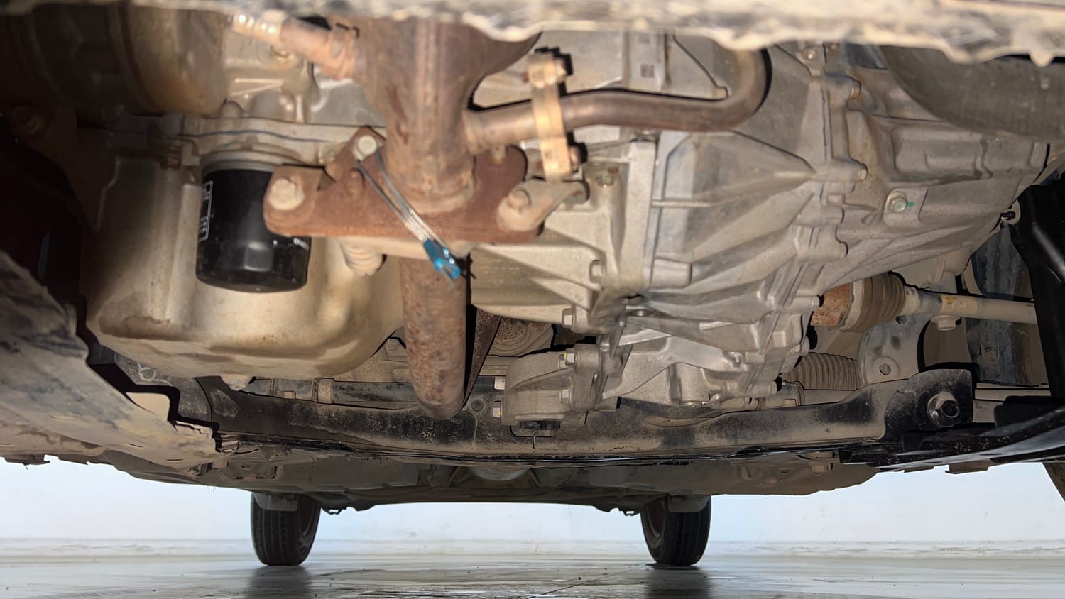 Used 2022 Maruti Suzuki Swift VXi AMT Petrol Automatic extra FRONT LEFT UNDERBODY VIEW