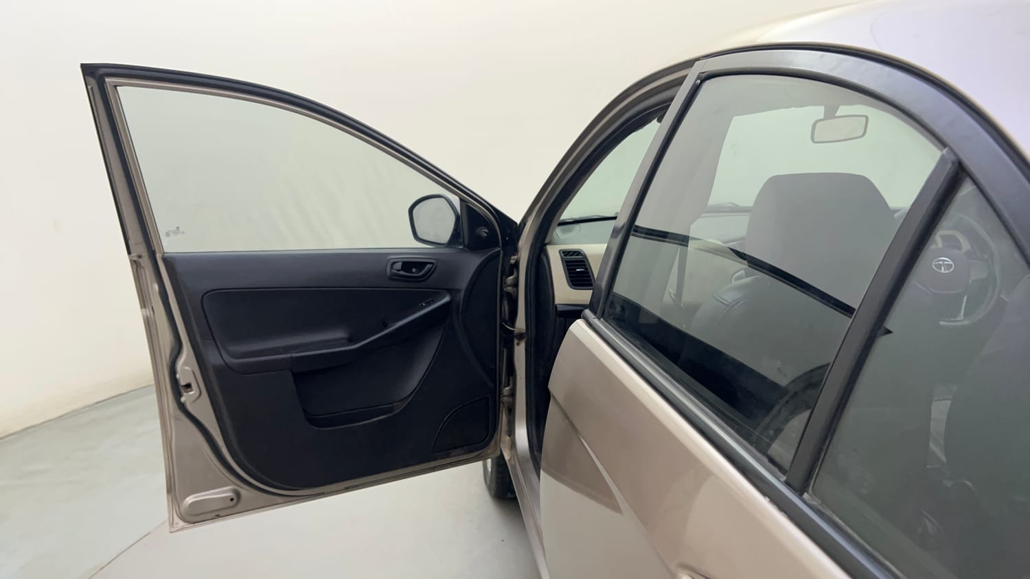 Used 2015 Tata Zest XE Petrol Petrol Manual interior LEFT FRONT DOOR OPEN VIEW