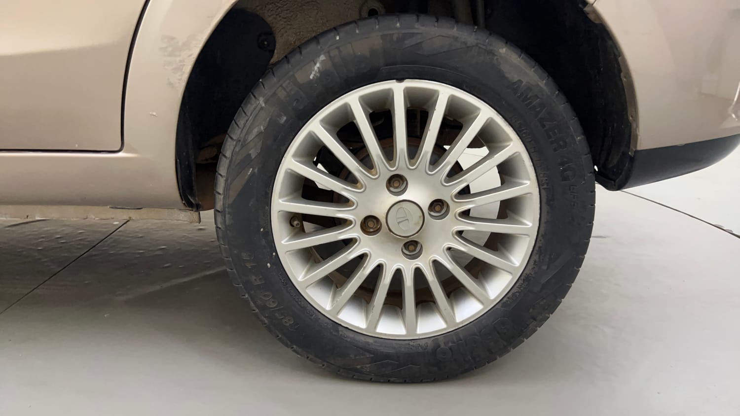 Used 2015 Tata Zest XE Petrol Petrol Manual tyres LEFT REAR TYRE RIM VIEW
