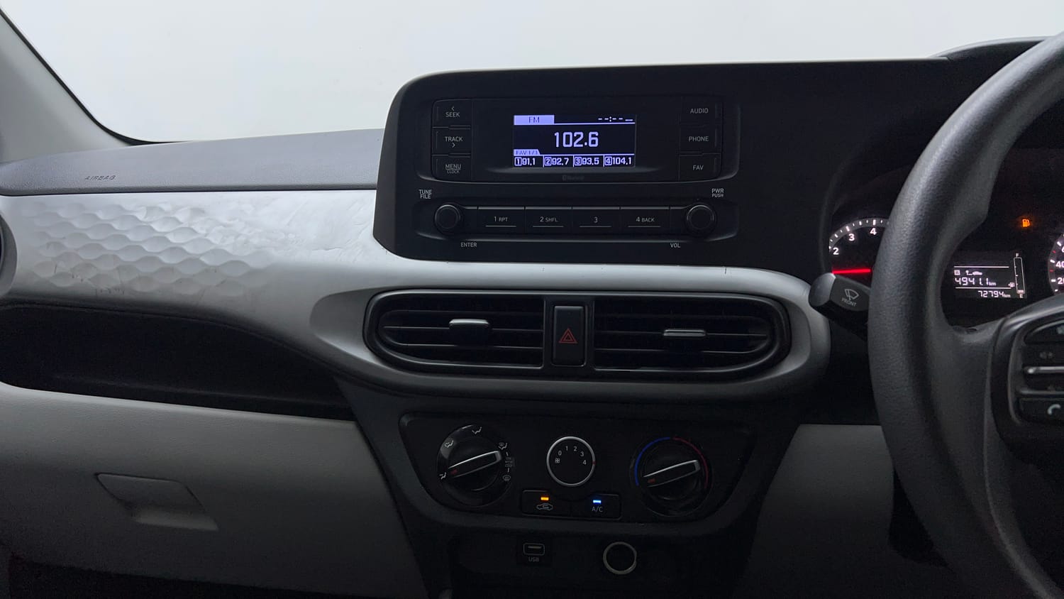 Used 2021 Hyundai Grand i10 Nios Magna 1.2 Kappa VTVT Petrol Manual top_features Integrated (in-dash) music system