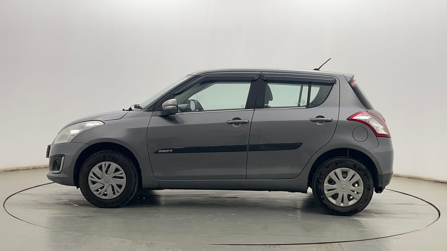 Used 2015 Maruti Suzuki Swift VXi Petrol Manual exterior LEFT SIDE VIEW