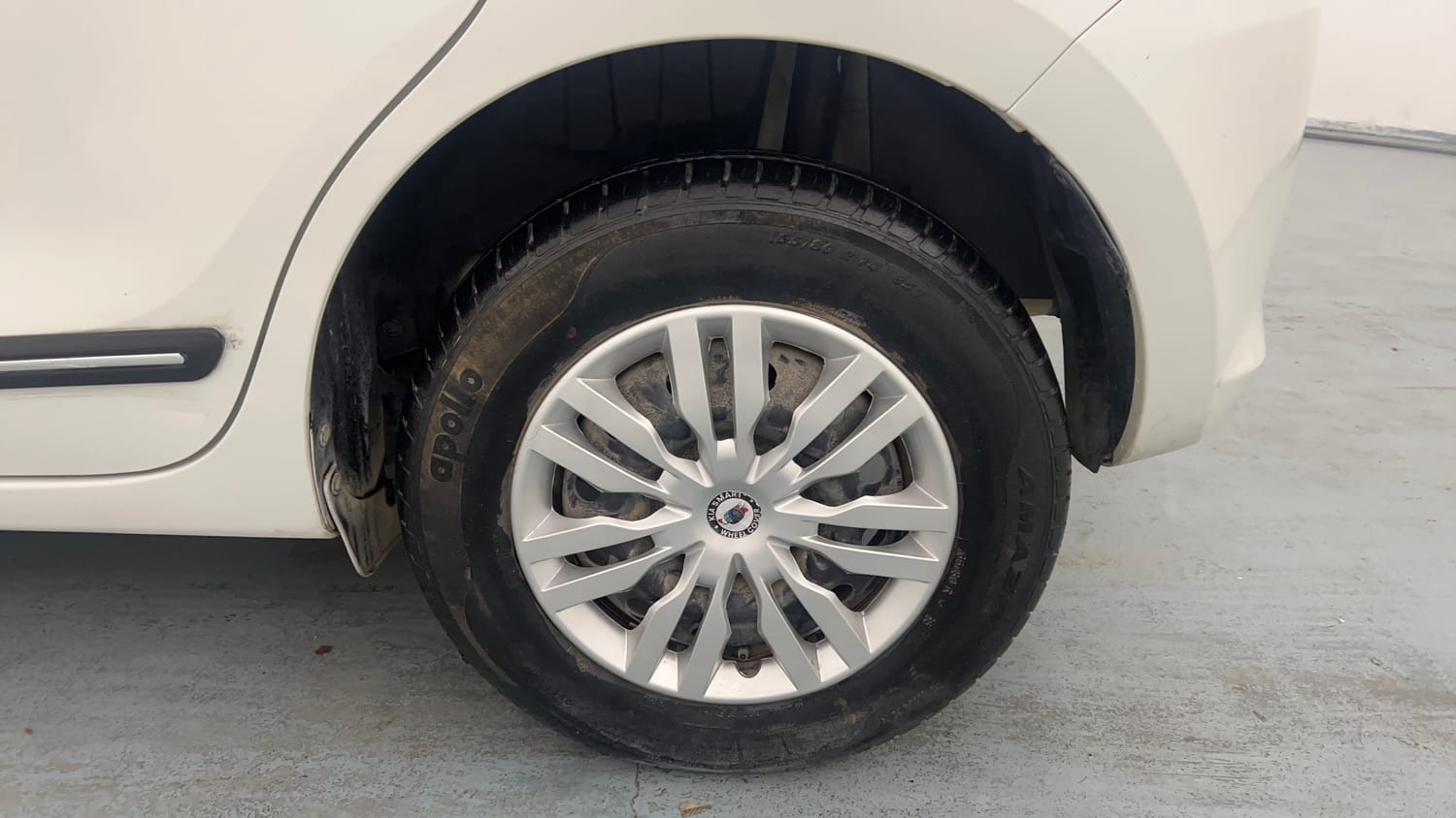 Used 2021 Maruti Suzuki Swift VXi Petrol Manual tyres LEFT REAR TYRE RIM VIEW