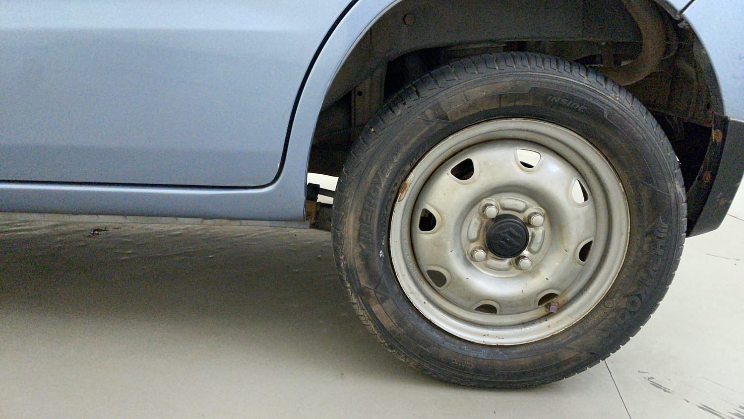 Used 2014 Maruti Suzuki Estilo LXi BS-IV Petrol Manual tyres LEFT REAR TYRE RIM VIEW