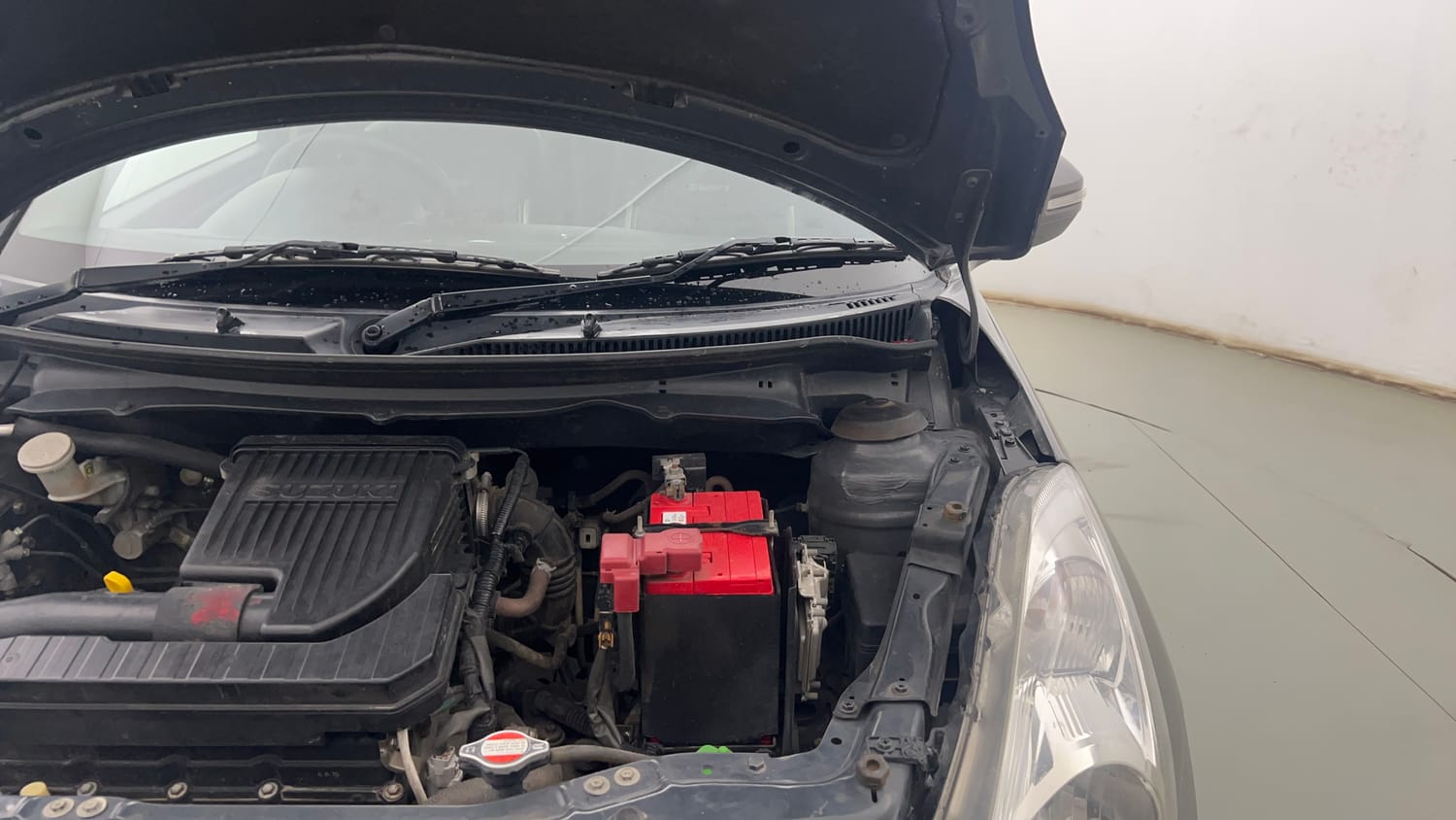 Used 2015 Maruti Suzuki Swift VXi Petrol Manual engine ENGINE LEFT SIDE HINGE & APRON VIEW