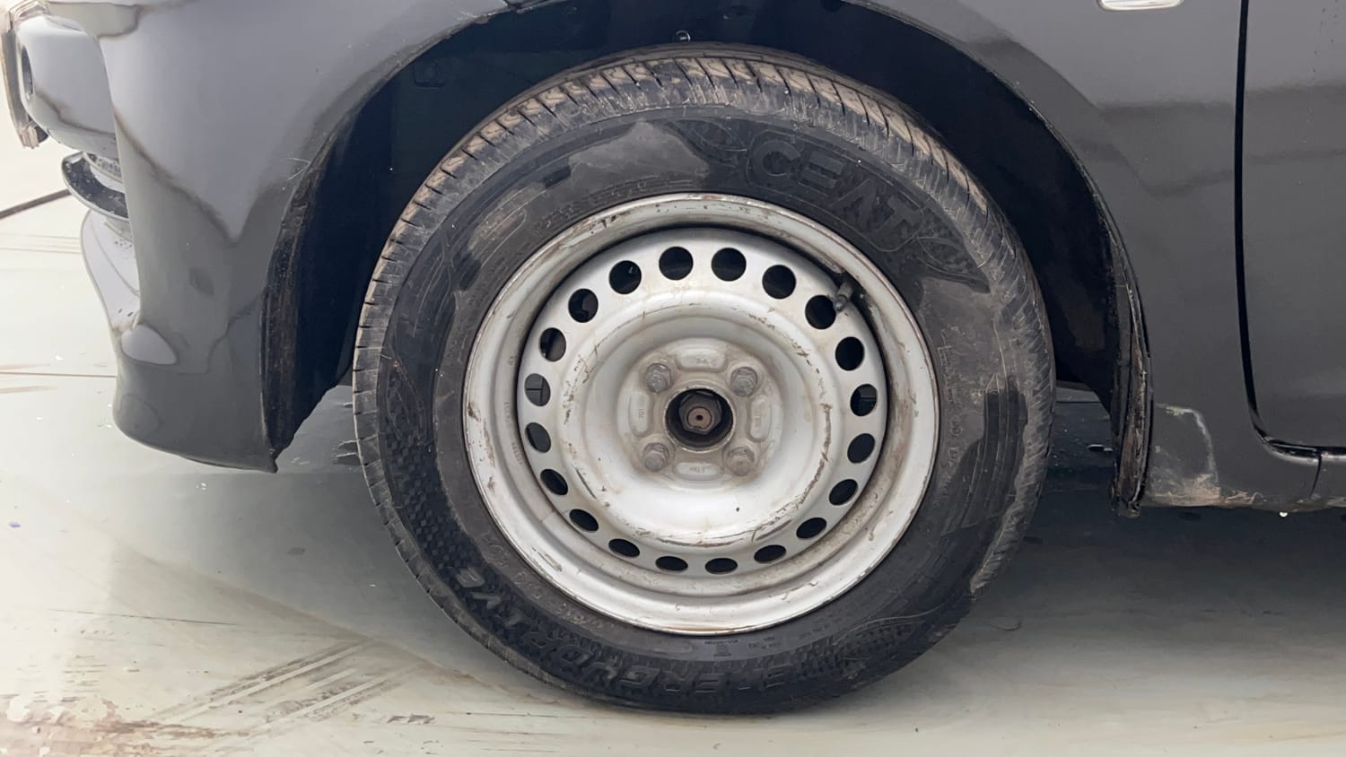 Used 2015 Honda Amaze 1.2 E i-VTEC Petrol Manual tyres LEFT FRONT TYRE RIM VIEW