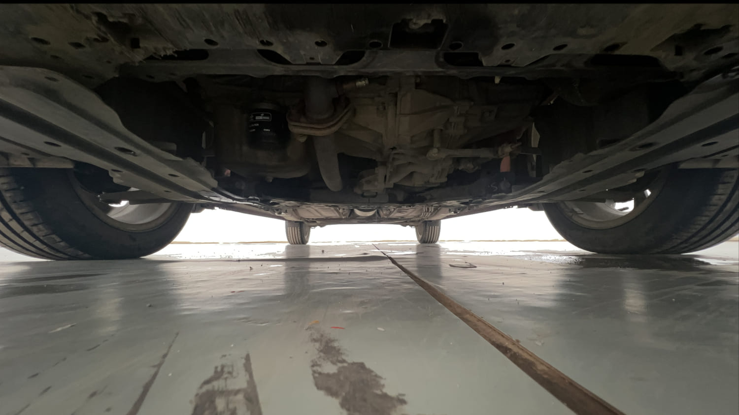 Used 2021 Toyota Glanza G Petrol Manual extra FRONT LEFT UNDERBODY VIEW
