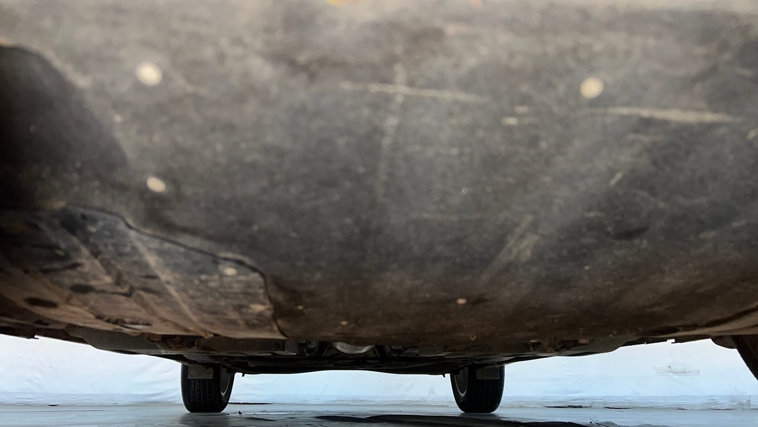 Used 2023 Maruti Suzuki Baleno Zeta MT Petrol Manual extra FRONT LEFT UNDERBODY VIEW