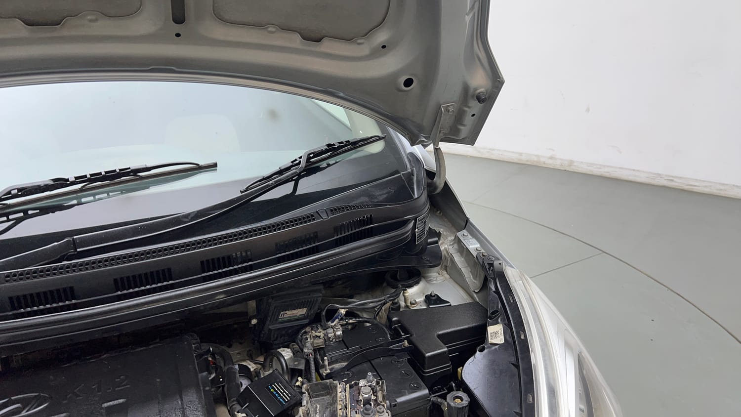 Used 2019 Hyundai Grand i10 Magna 1.2 Kappa VTVT CNG (outside fitted) Cng Manual engine ENGINE LEFT SIDE HINGE & APRON VIEW