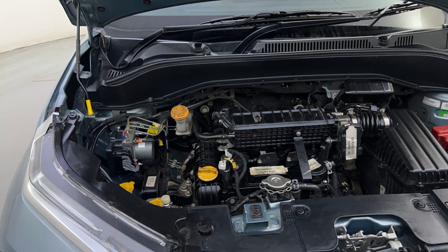 Used 2024 Tata Punch Creative Dual Tone AMT Petrol Automatic engine ENGINE RIGHT SIDE HINGE & APRON VIEW