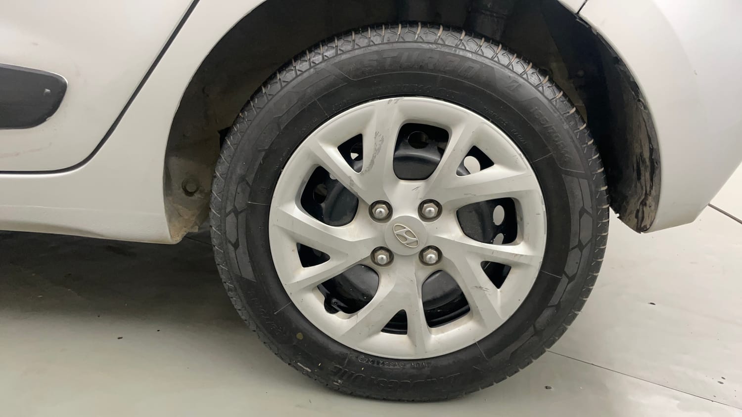 Used 2018 Hyundai Grand i10 Sportz 1.2 Kappa VTVT Petrol Manual tyres LEFT REAR TYRE RIM VIEW