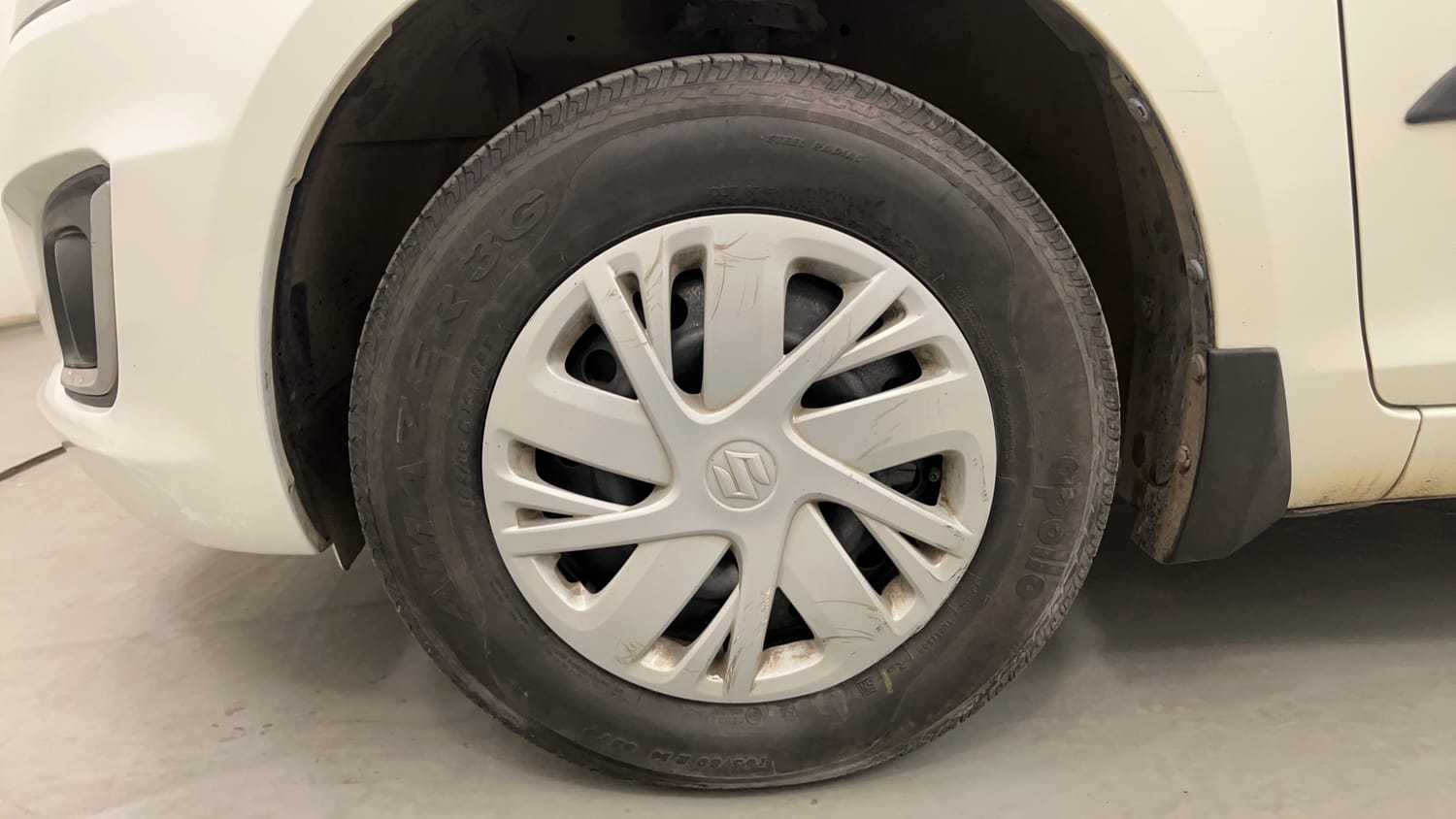 Used 2015 Maruti Suzuki Swift VXi Petrol Manual tyres LEFT FRONT TYRE RIM VIEW