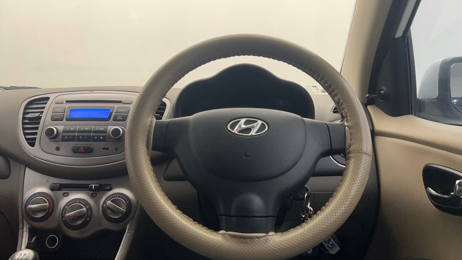 Used 2013 Hyundai i10 Magna 1.1 iRDE2 Petrol Manual interior STEERING VIEW