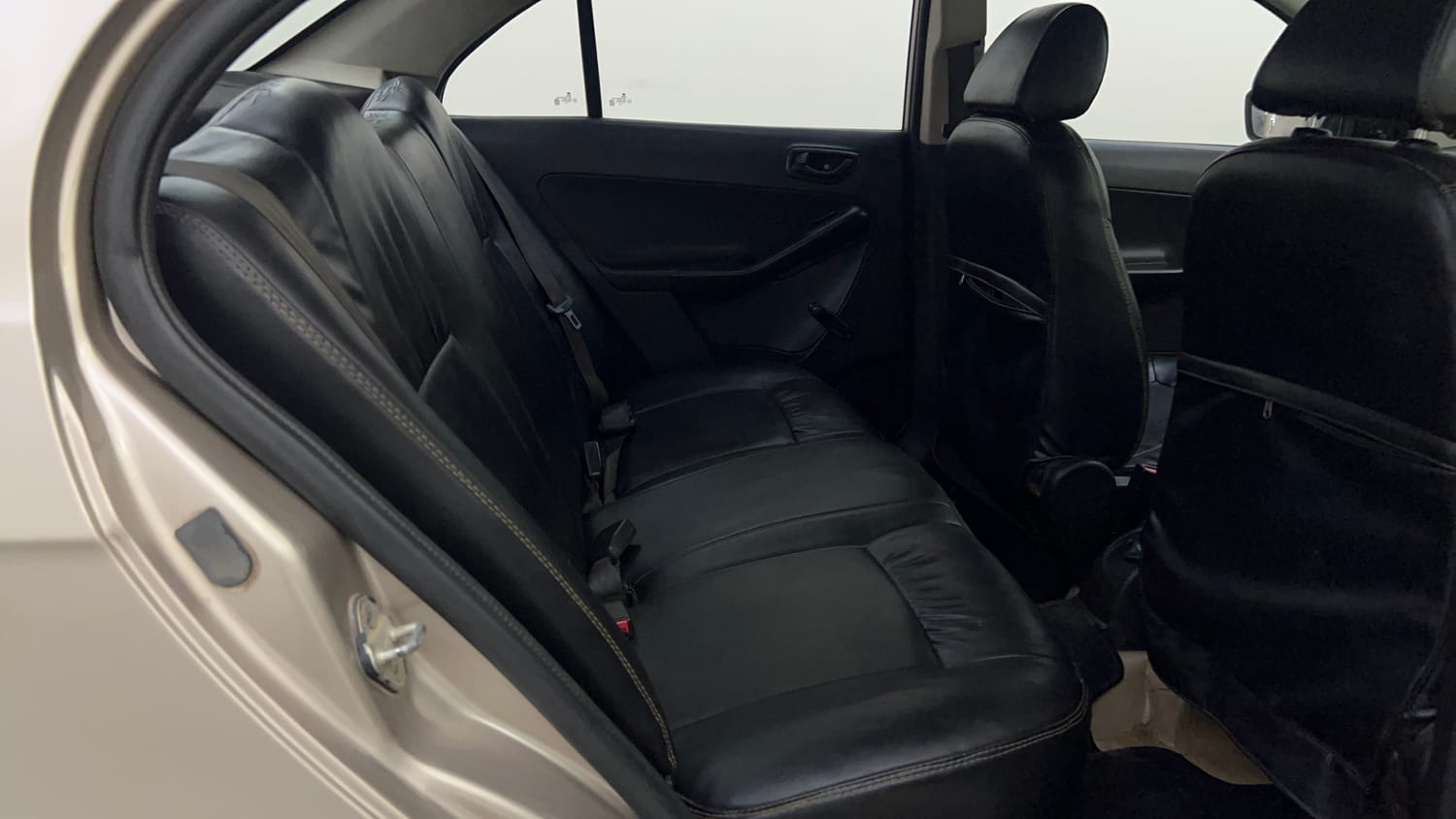 Used 2015 Tata Zest XE Petrol Petrol Manual interior RIGHT SIDE REAR DOOR CABIN VIEW