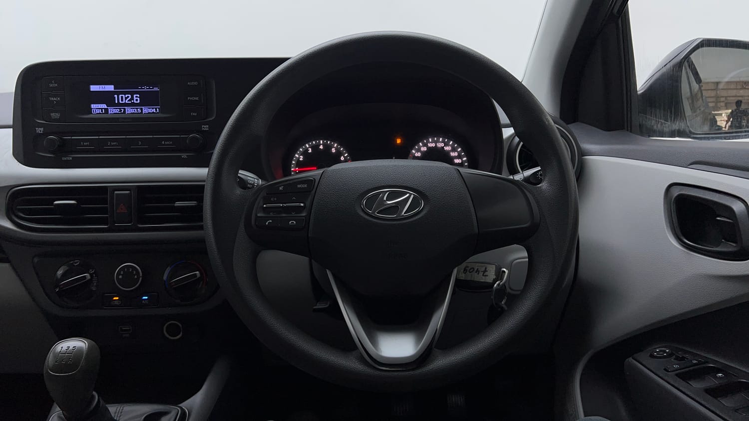Used 2021 Hyundai Grand i10 Nios Magna 1.2 Kappa VTVT Petrol Manual interior STEERING VIEW