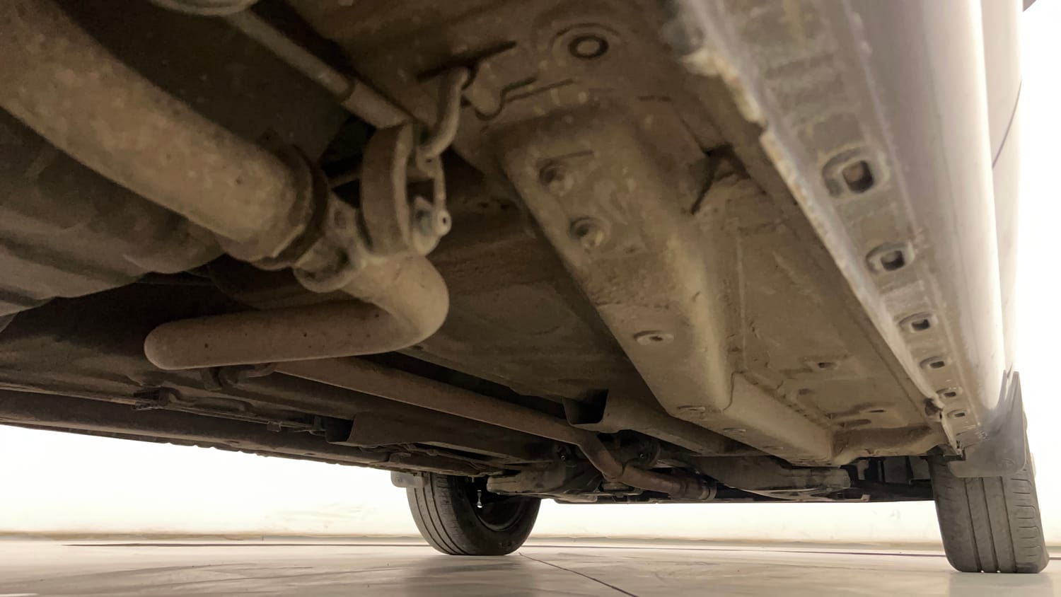 Used 2015 Tata Zest XMS Petrol Petrol Manual extra REAR RIGHT UNDERBODY VIEW