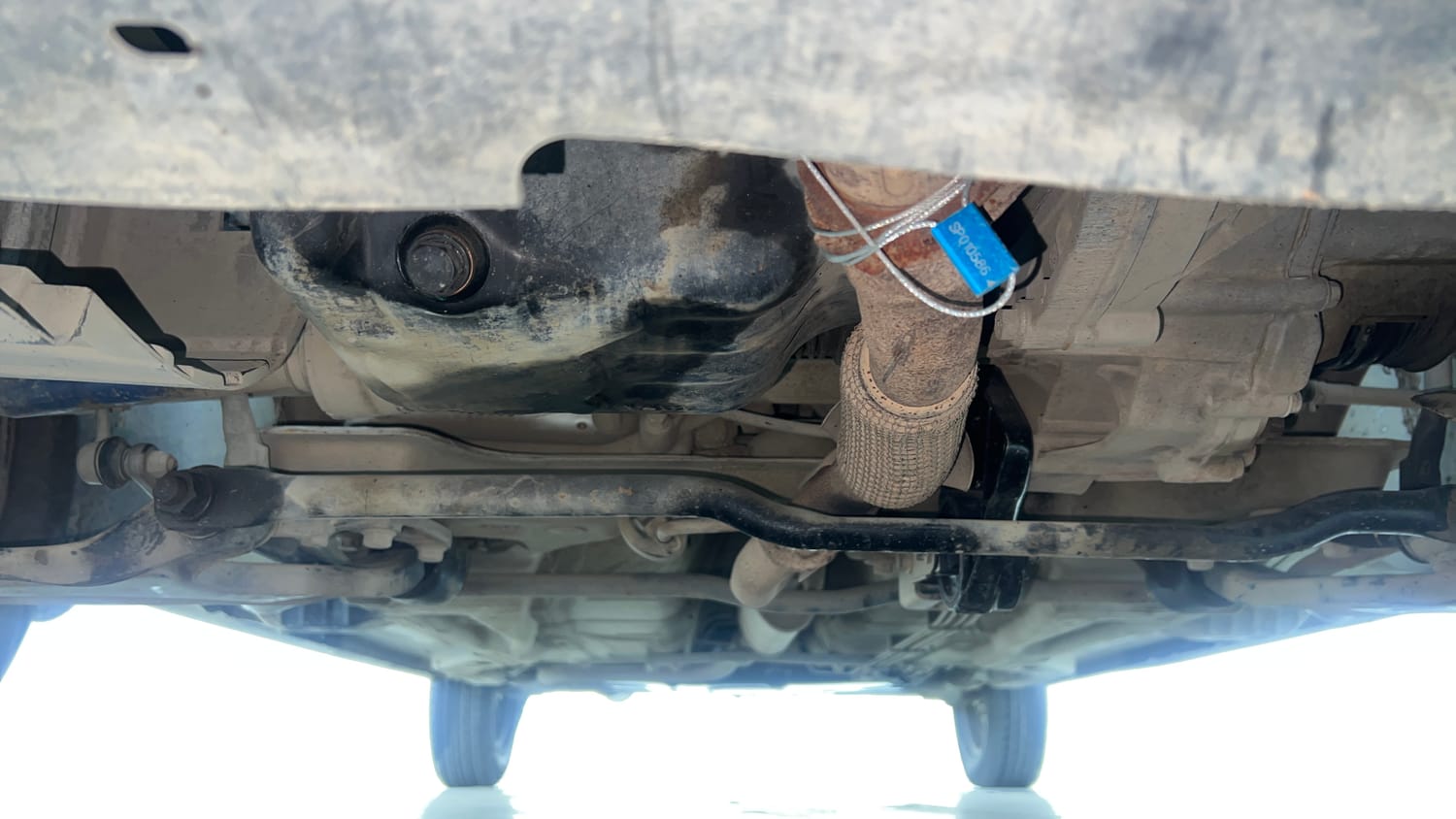 Used 2017 Tata Tiago Revotron XM Petrol Manual extra FRONT LEFT UNDERBODY VIEW