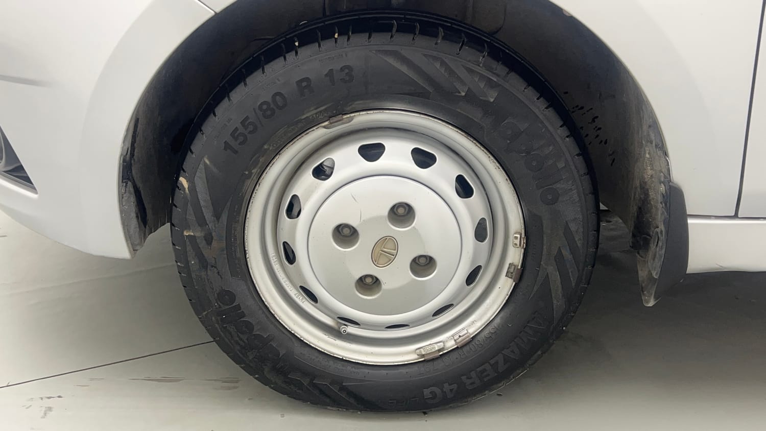 Used 2017 Tata Tiago Revotron XM Petrol Manual tyres LEFT FRONT TYRE RIM VIEW