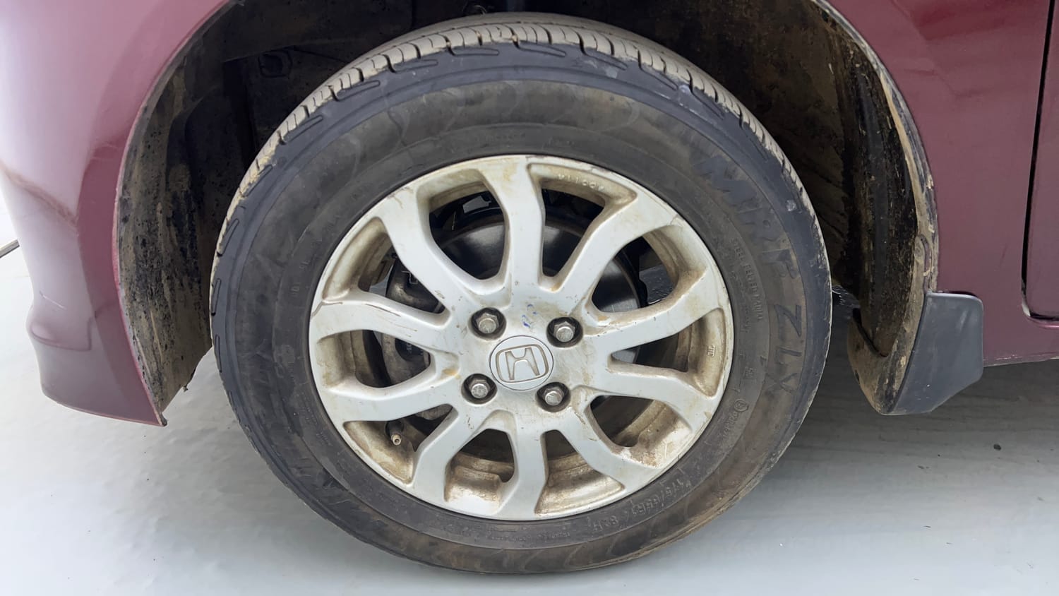 Used 2014 Honda Amaze 1.2 VX i-VTEC Petrol Manual tyres LEFT FRONT TYRE RIM VIEW