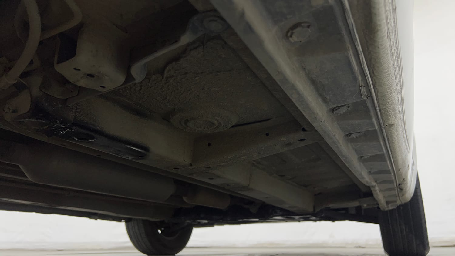 Used 2017 Maruti Suzuki Swift Lxi (O) Petrol Manual extra REAR RIGHT UNDERBODY VIEW