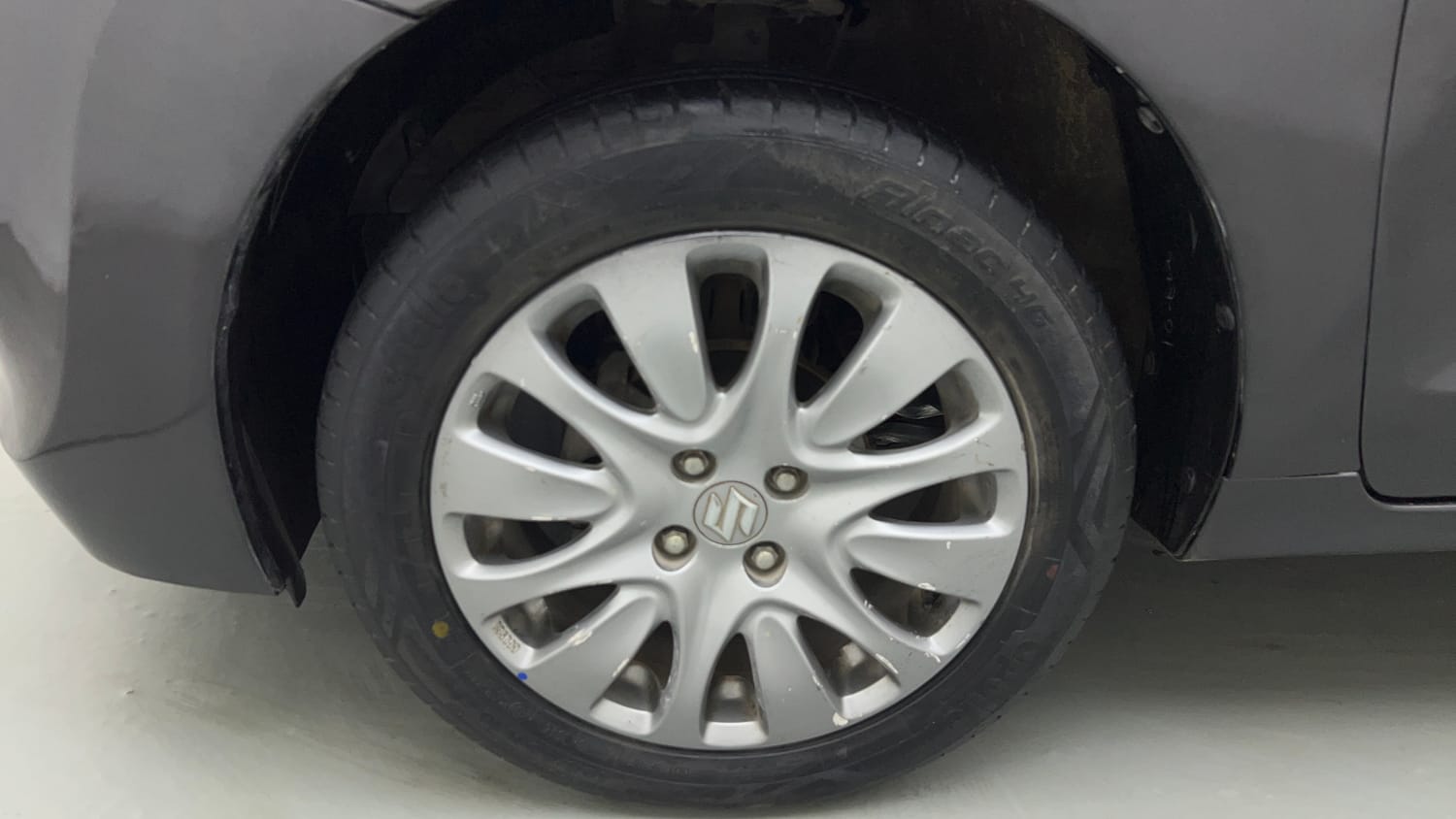Used 2018 Maruti Suzuki Baleno Zeta 1.2 Petrol Manual tyres LEFT FRONT TYRE RIM VIEW