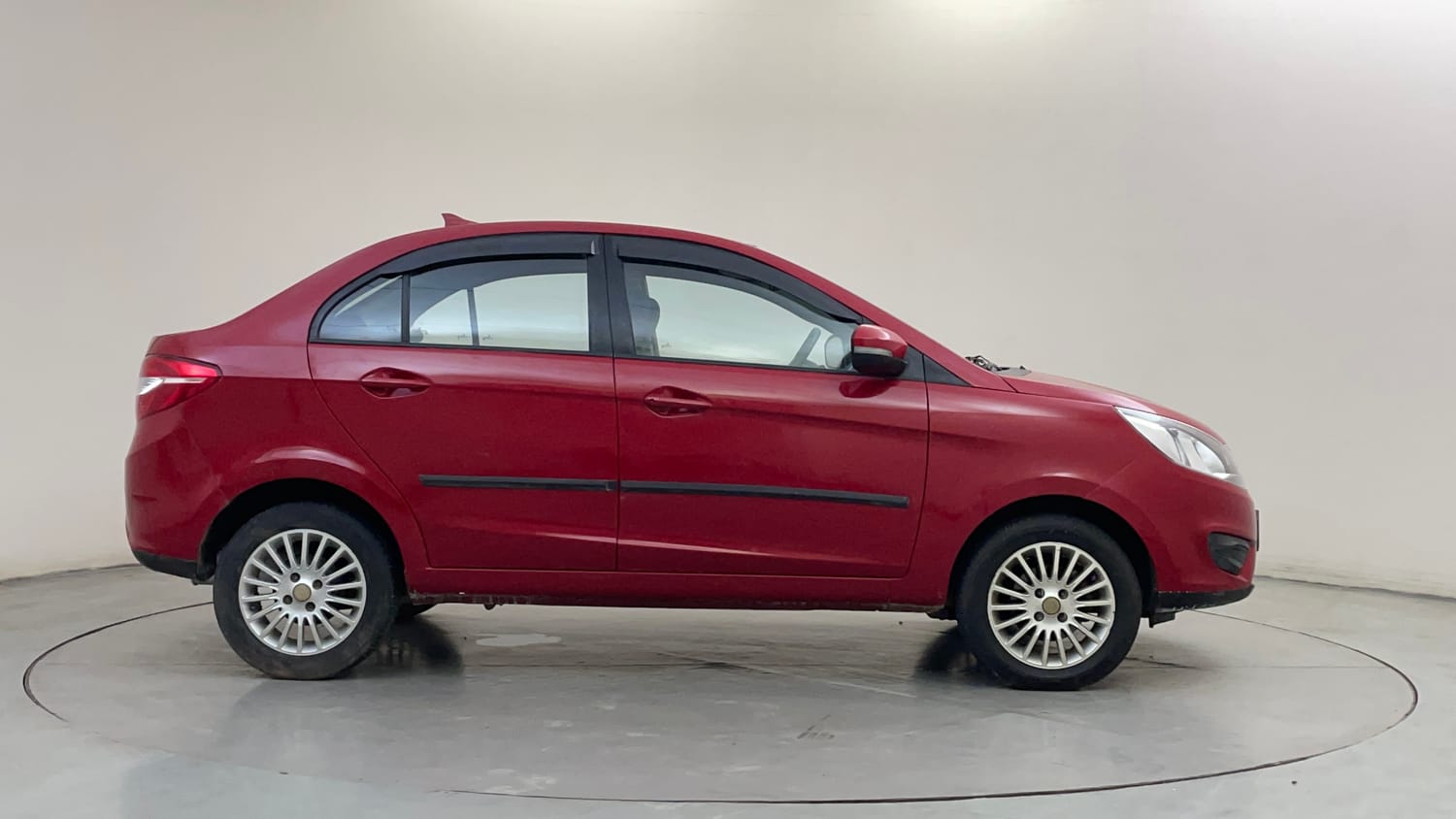 Used 2014 Tata Zest XE Petrol Petrol Manual exterior RIGHT SIDE VIEW