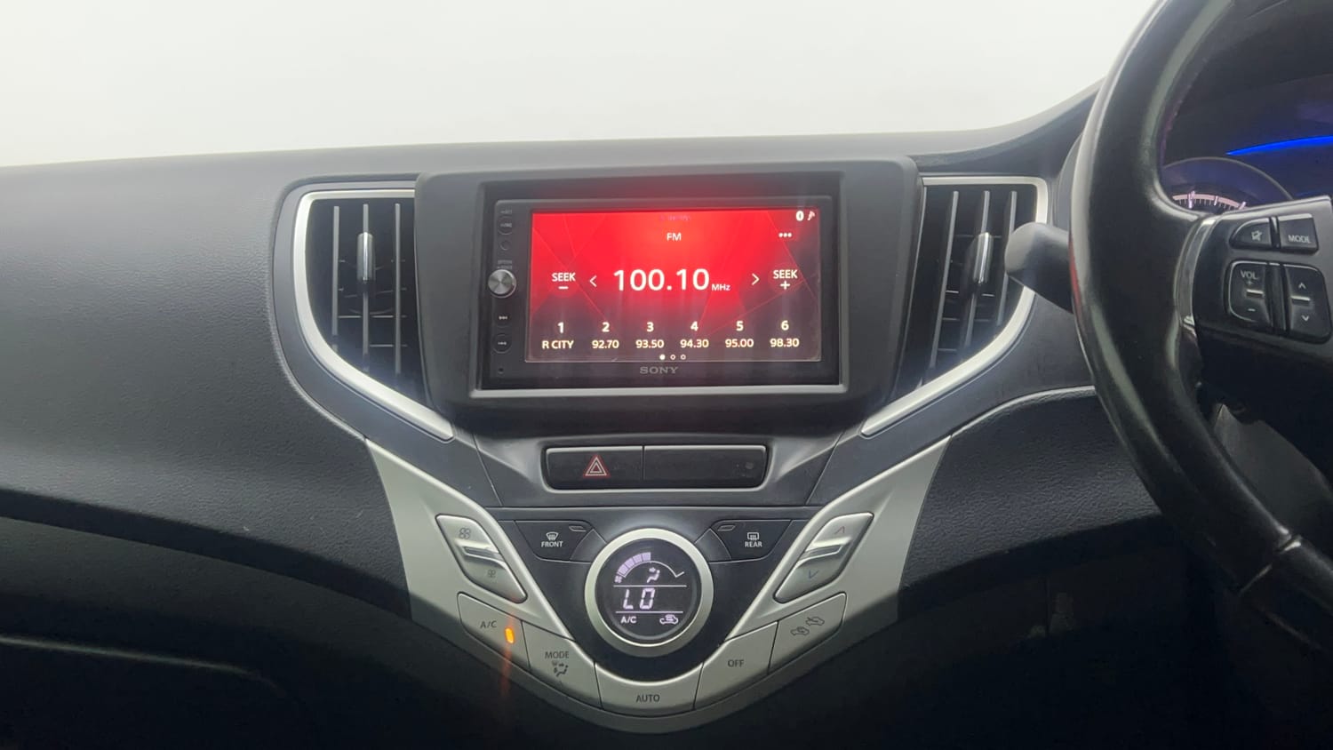 Used 2018 Maruti Suzuki Baleno Zeta 1.2 Petrol Manual interior MUSIC SYSTEM & AC CONTROL VIEW