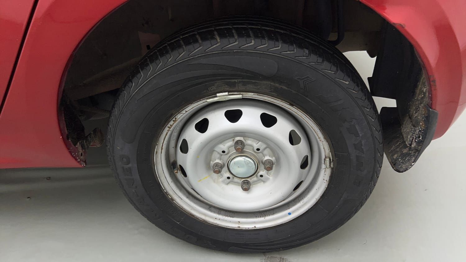 Used 2019 Tata Tiago Revotron XE Petrol Manual tyres LEFT REAR TYRE RIM VIEW