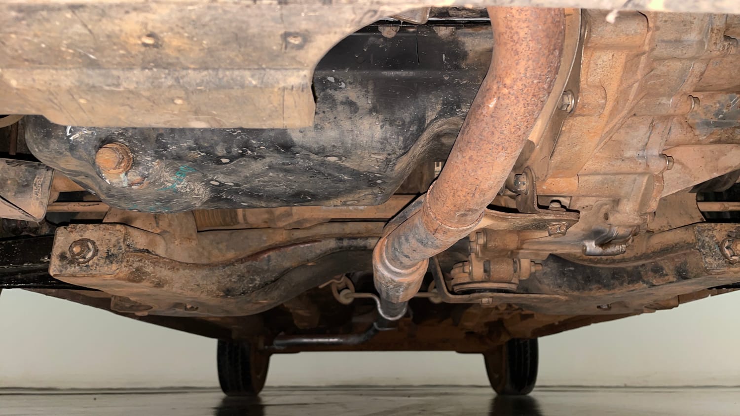 Used 2014 Tata Zest XE Petrol Petrol Manual extra FRONT LEFT UNDERBODY VIEW