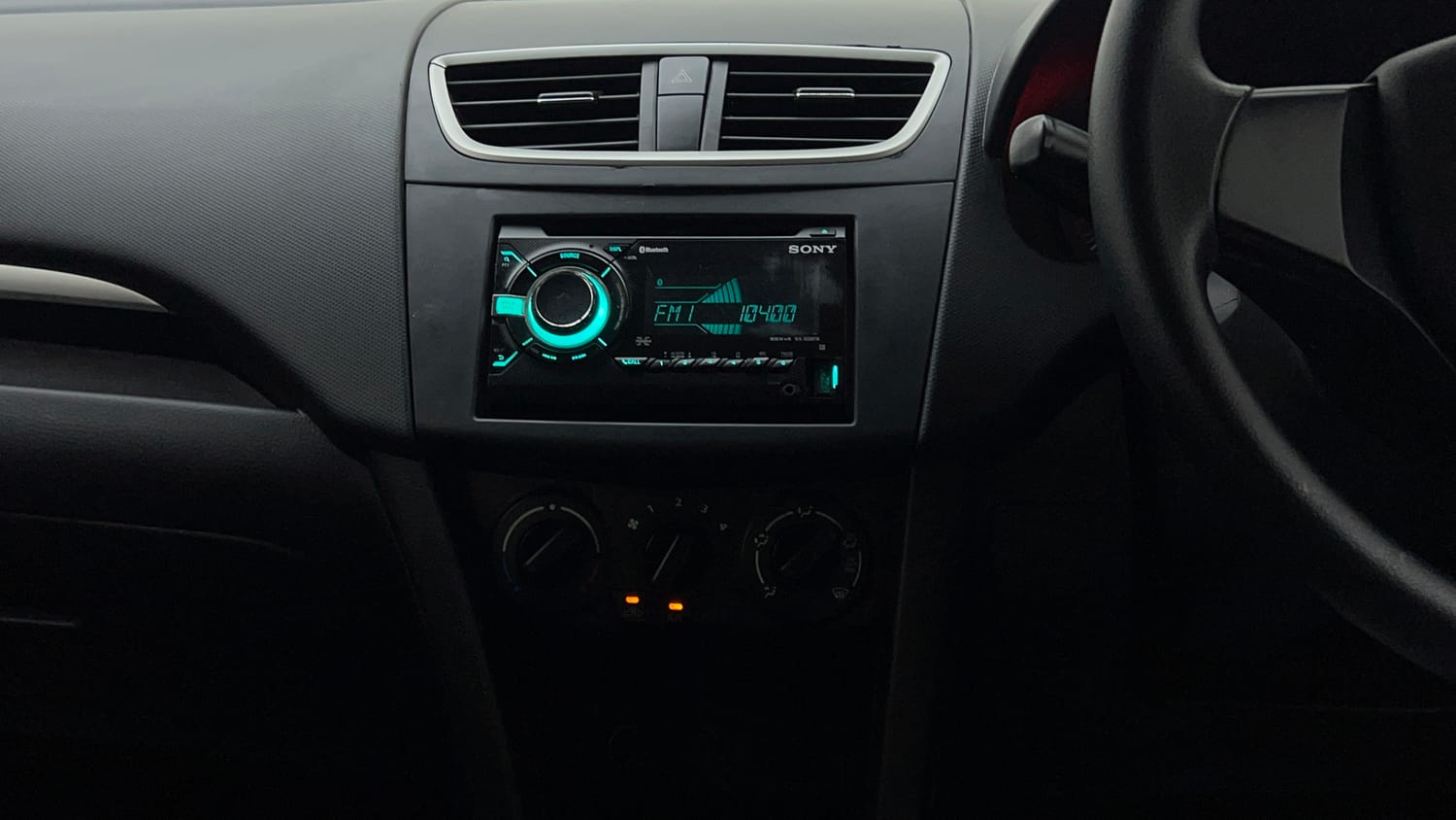 Used 2017 Maruti Suzuki Swift Lxi (O) Petrol Manual interior MUSIC SYSTEM & AC CONTROL VIEW