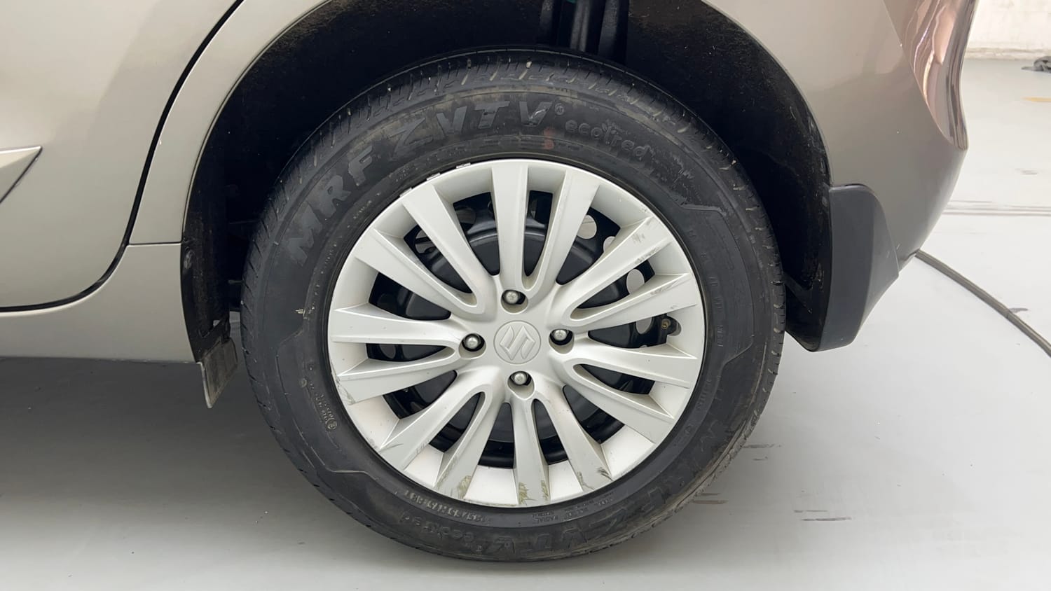 Used 2021 Maruti Suzuki Baleno Delta Petrol Manual tyres LEFT REAR TYRE RIM VIEW