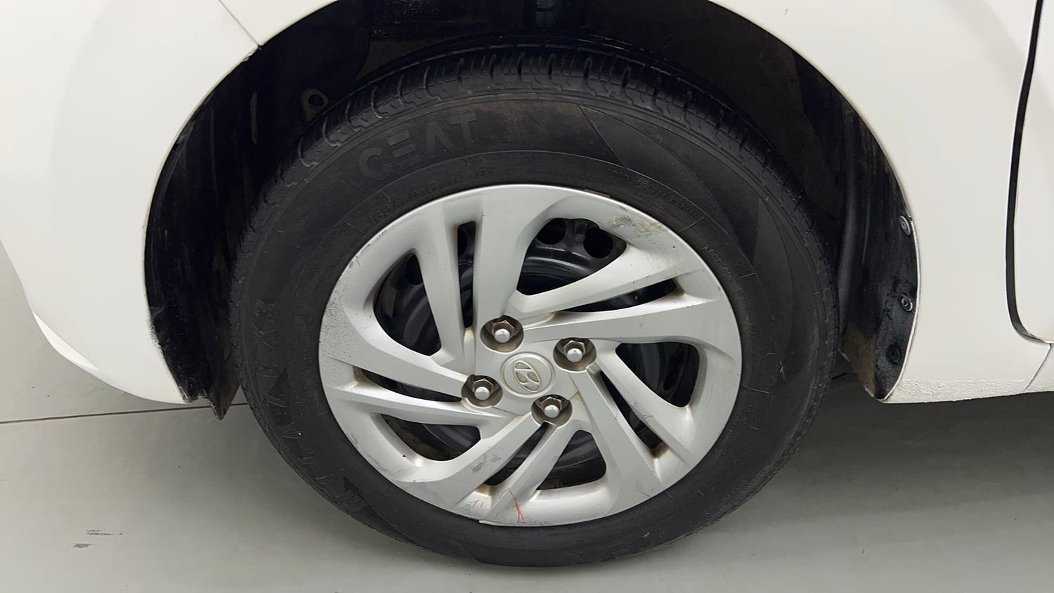 Used 2022 Hyundai Aura S 1.2 Petrol Petrol Manual tyres LEFT FRONT TYRE RIM VIEW