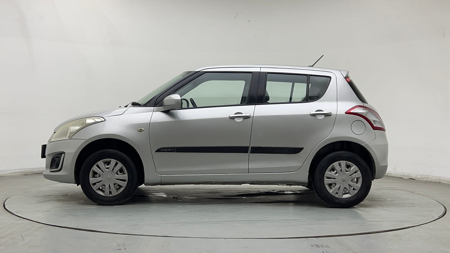 Used 2017 Maruti Suzuki Swift Lxi (O) Petrol Manual exterior LEFT SIDE VIEW