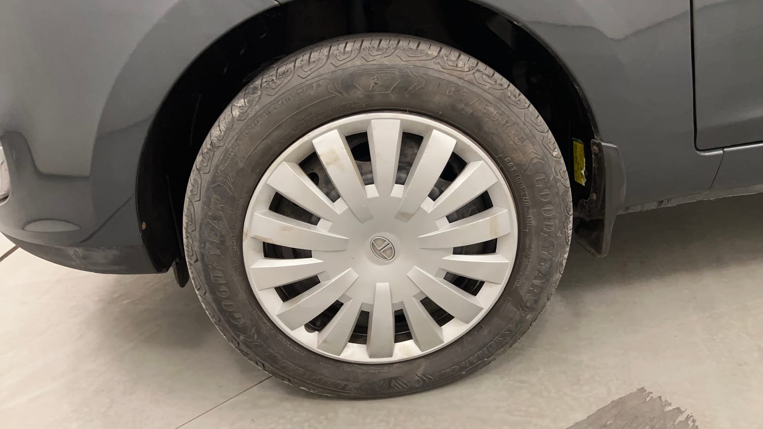 Used 2015 Tata Zest XMS Petrol Petrol Manual tyres LEFT FRONT TYRE RIM VIEW