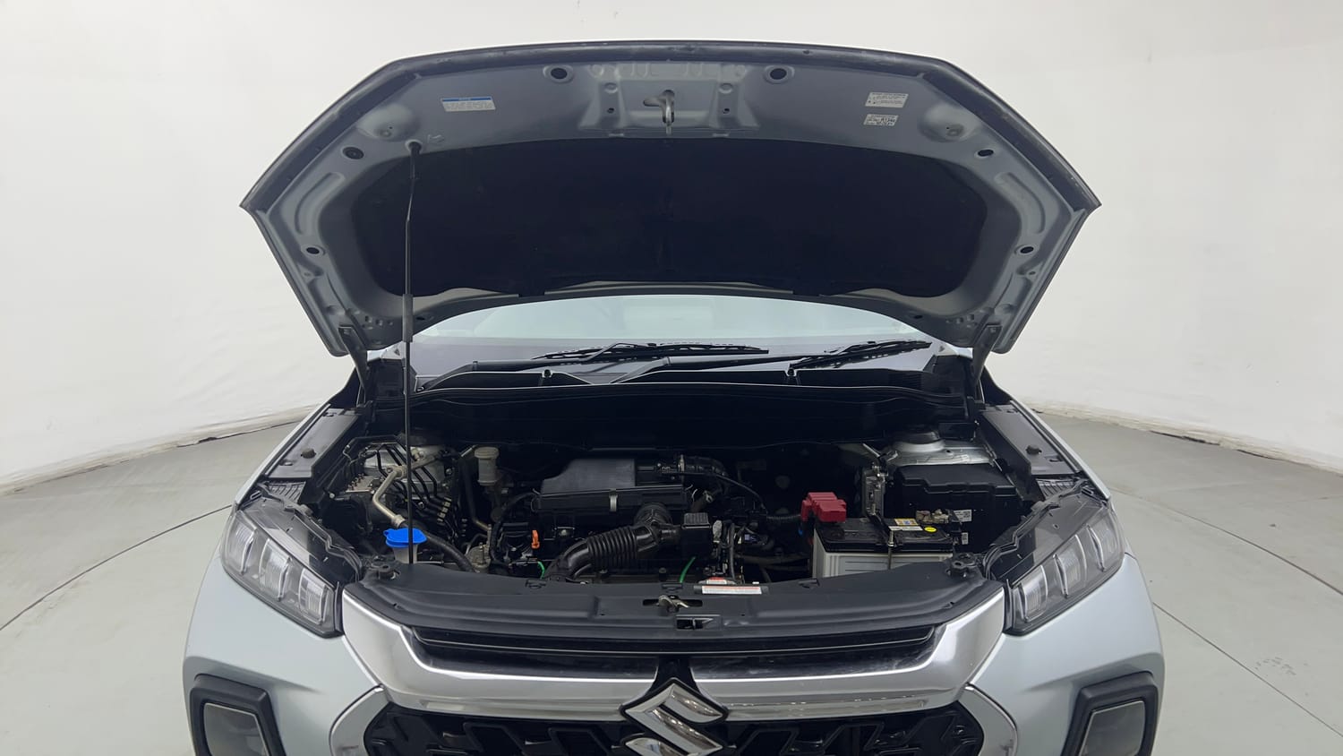 Used 2024 Maruti Suzuki Grand Vitara Delta Smart Hybrid Petrol Manual engine ENGINE & BONNET OPEN FRONT VIEW