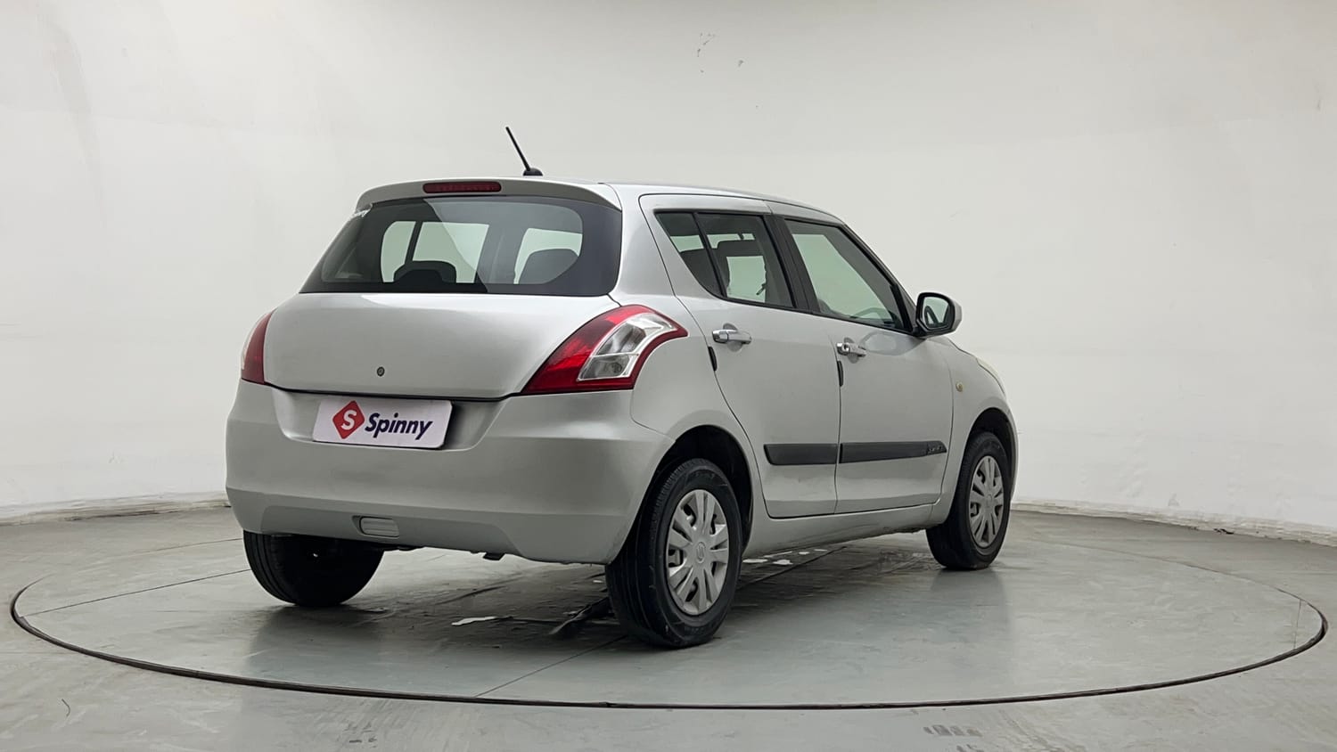 Used 2017 Maruti Suzuki Swift Lxi (O) Petrol Manual exterior RIGHT REAR CORNER VIEW