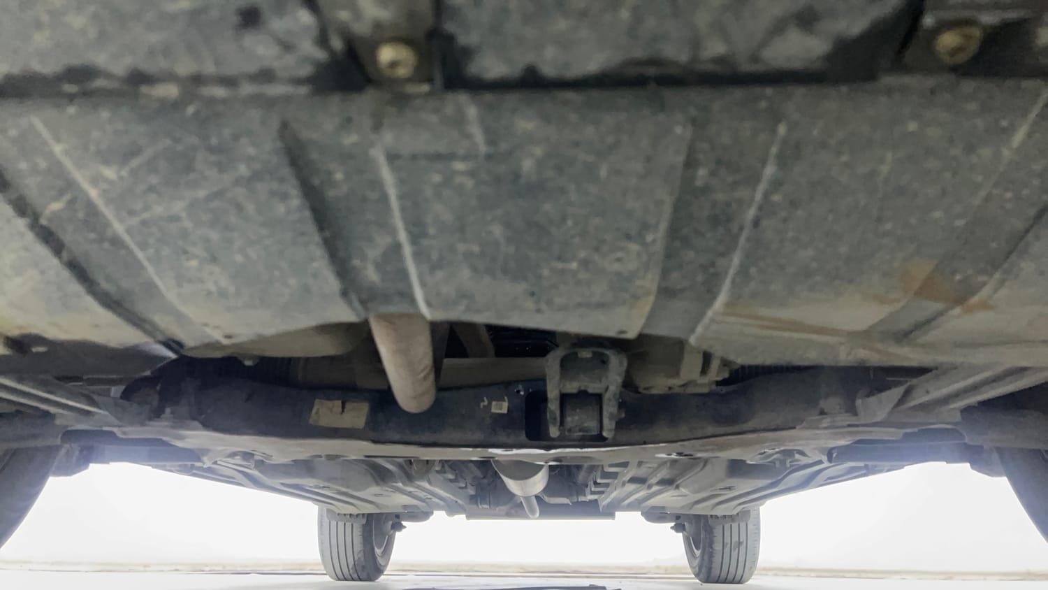 Used 2024 Maruti Suzuki Brezza Zxi Plus Dual Tone Petrol Manual extra FRONT LEFT UNDERBODY VIEW