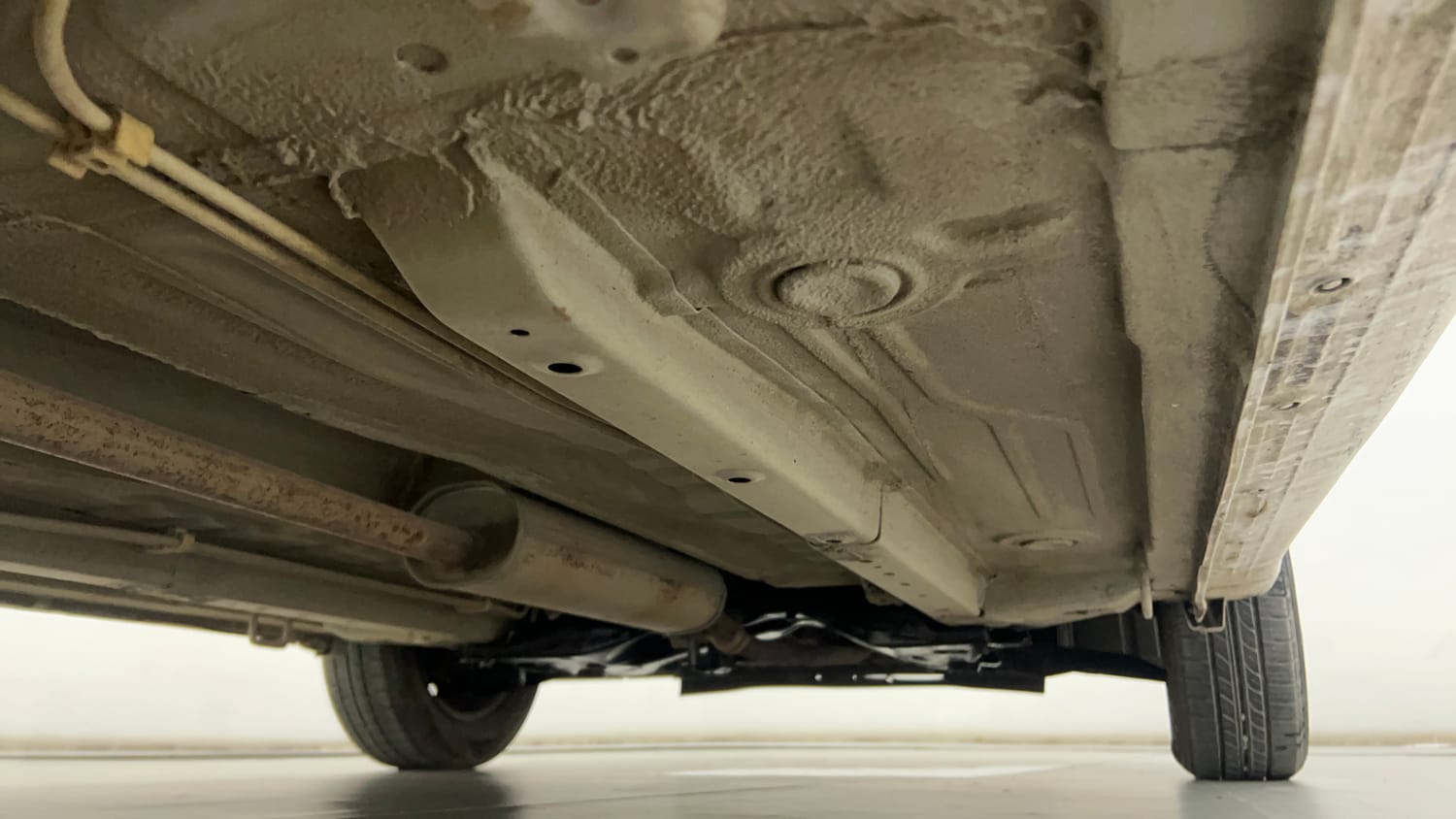 Used 2015 Maruti Suzuki Celerio VXi AMT Petrol Automatic extra REAR RIGHT UNDERBODY VIEW