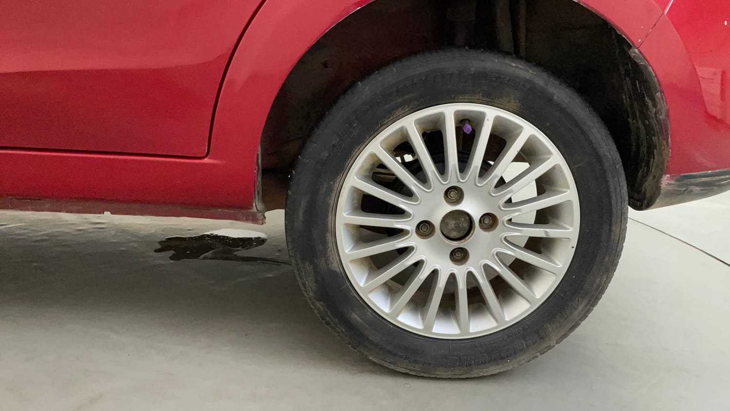 Used 2014 Tata Zest XE Petrol Petrol Manual tyres LEFT REAR TYRE RIM VIEW