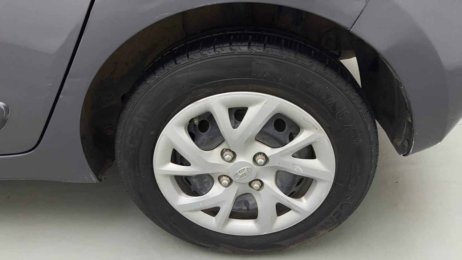 Used 2019 Hyundai Grand i10 Magna 1.2 Kappa VTVT Petrol Manual tyres LEFT REAR TYRE RIM VIEW
