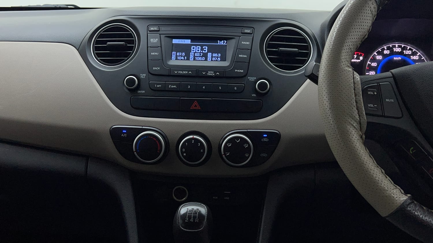 Used 2019 Hyundai Grand i10 Magna 1.2 Kappa VTVT Petrol Manual interior MUSIC SYSTEM & AC CONTROL VIEW