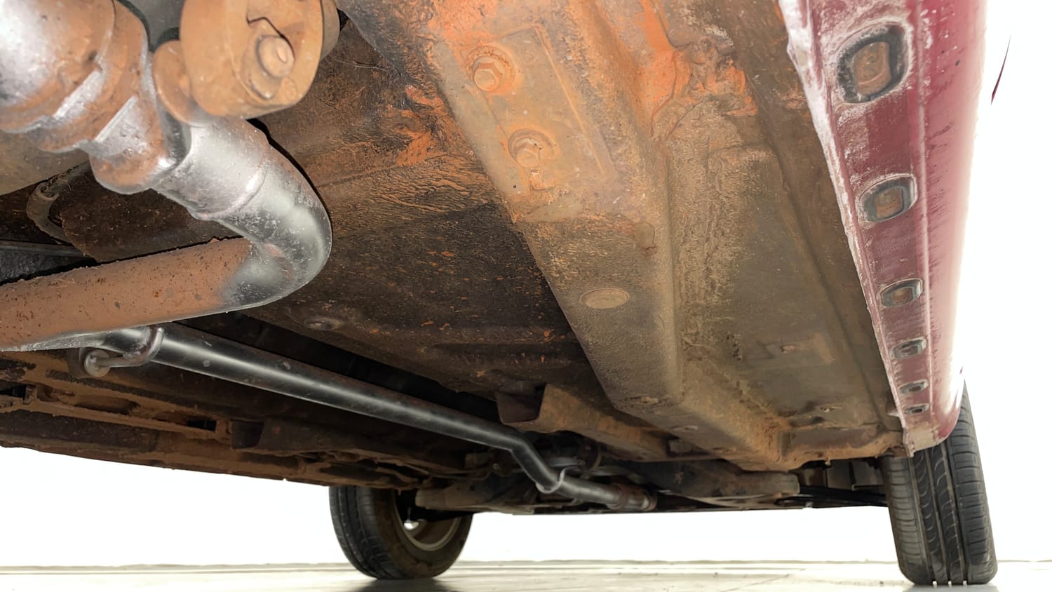Used 2014 Tata Zest XE Petrol Petrol Manual extra REAR RIGHT UNDERBODY VIEW