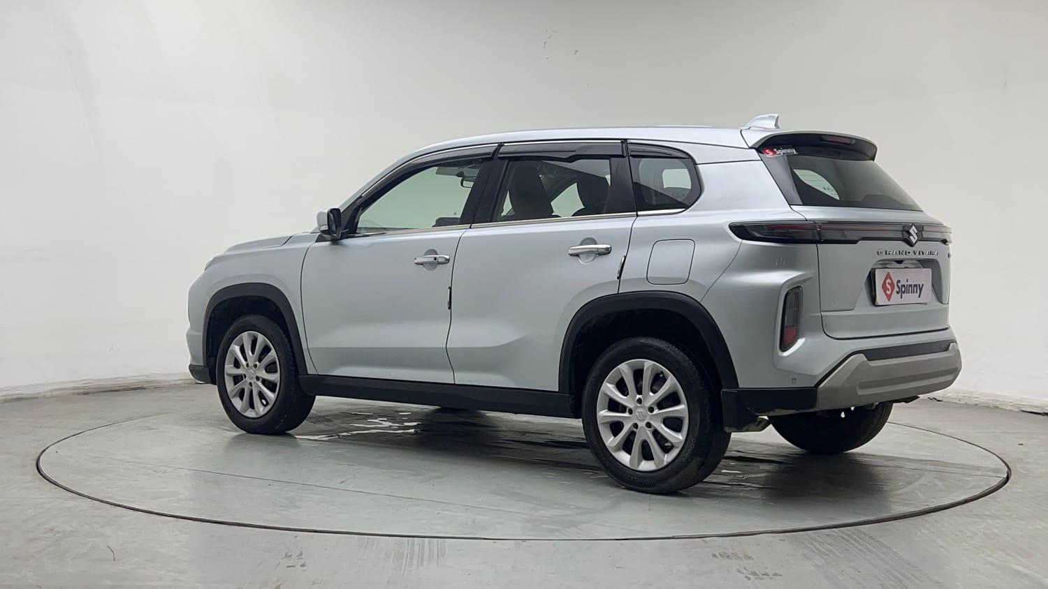 Used 2024 Maruti Suzuki Grand Vitara Delta Smart Hybrid Petrol Manual exterior LEFT REAR CORNER VIEW