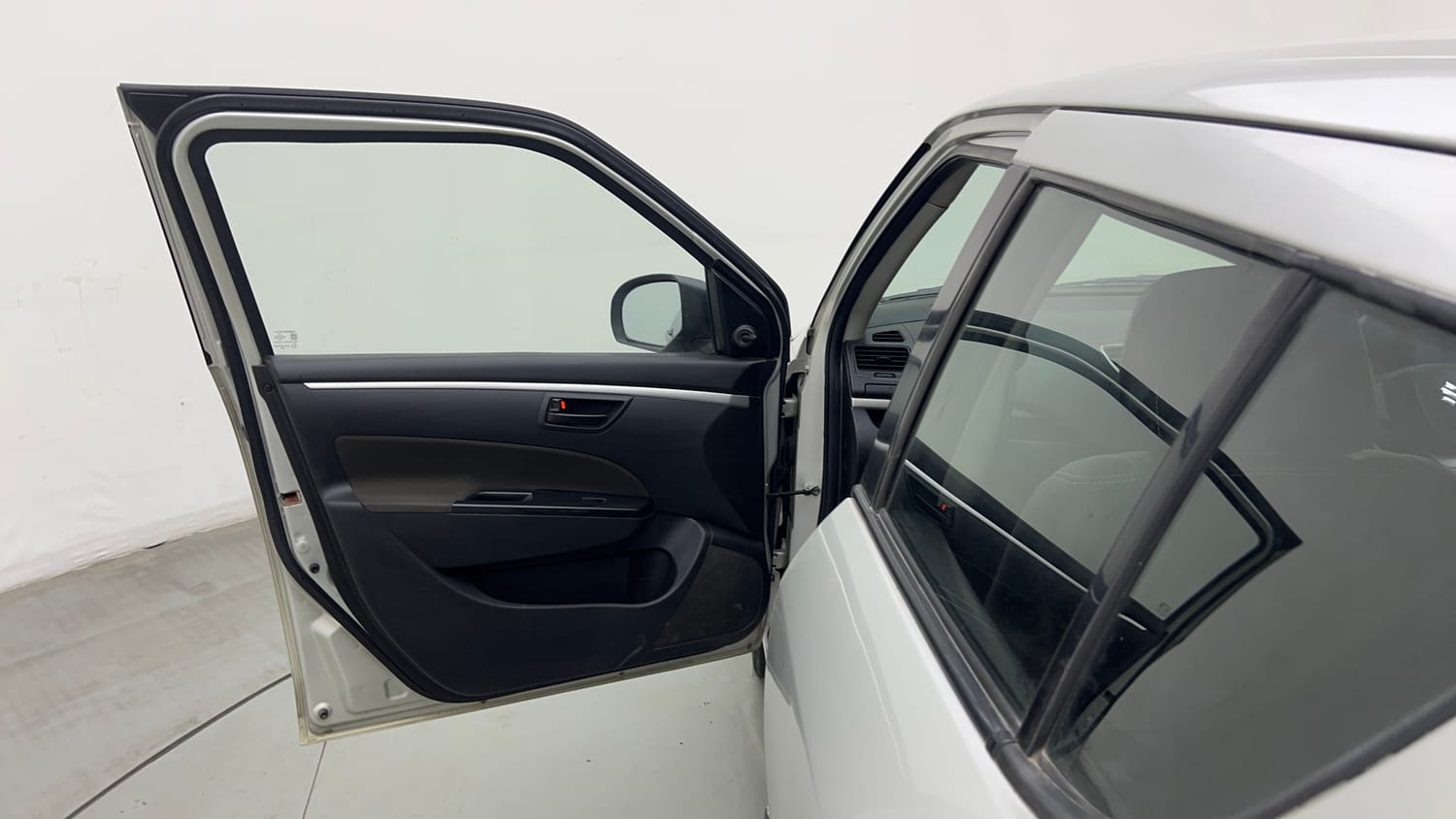 Used 2017 Maruti Suzuki Swift Lxi (O) Petrol Manual interior LEFT FRONT DOOR OPEN VIEW